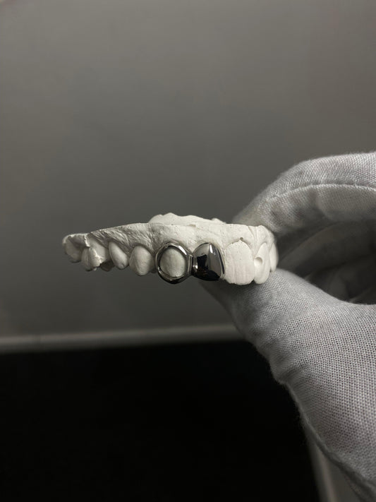 Solid lateral Incisor + Window Canine Grillz