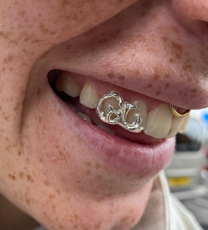 Abstract Double Cap Silver Grillz UK | Custom Twin Cap Design | Green Skull Grillz