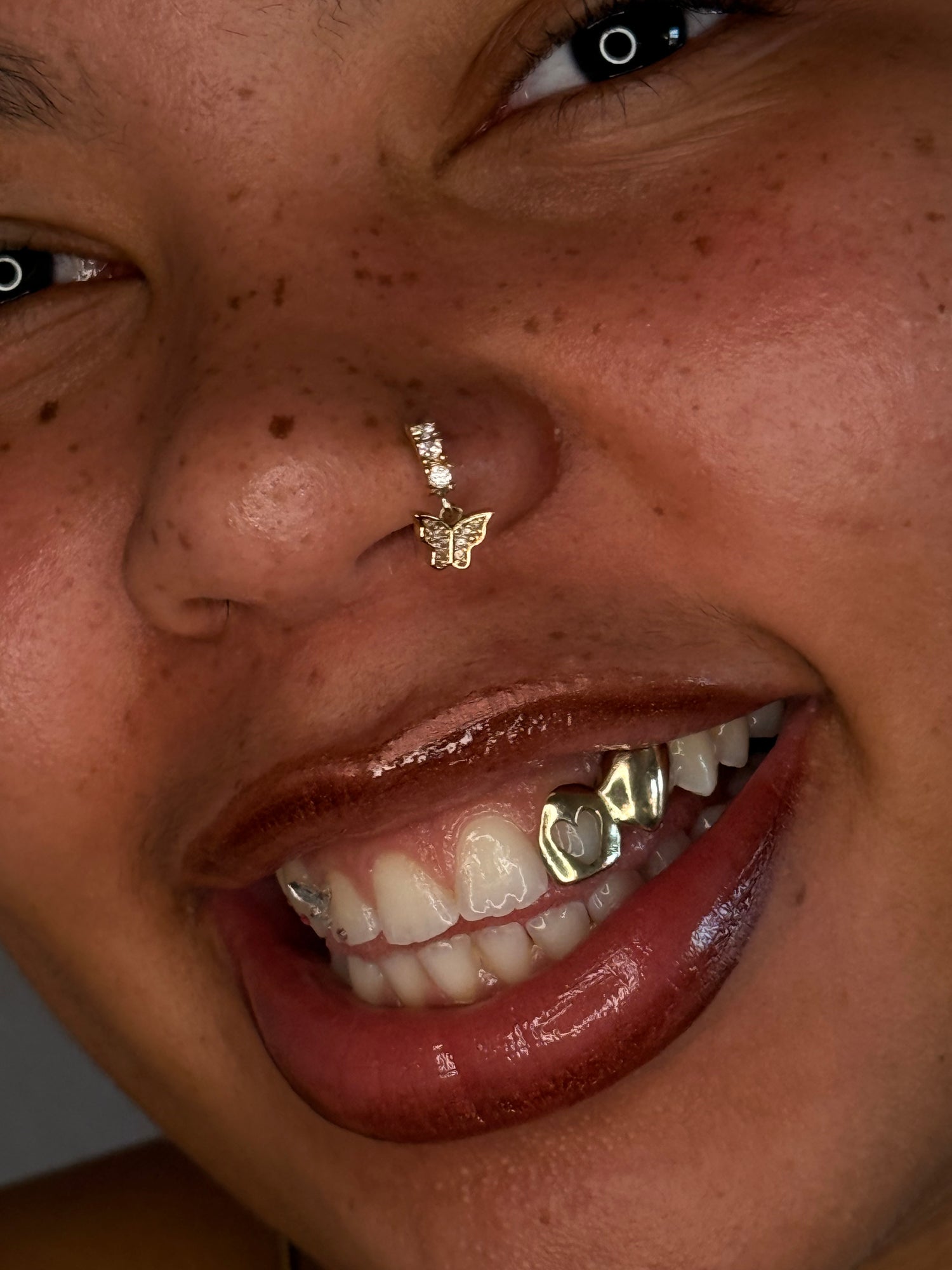 Customer wearing bespoke custom grillz by Green Skull